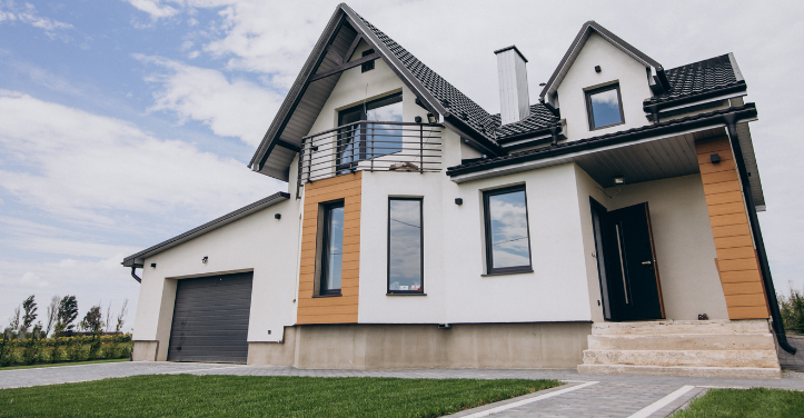 Contemporary family house with large windows and balcony railing